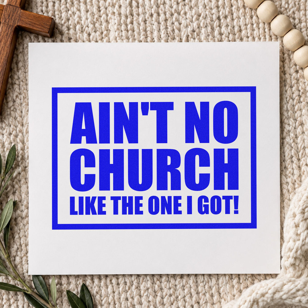 Ain't No Church Block craft stamp imprinted in blue ink on paper, a design suited to homecoming programs.