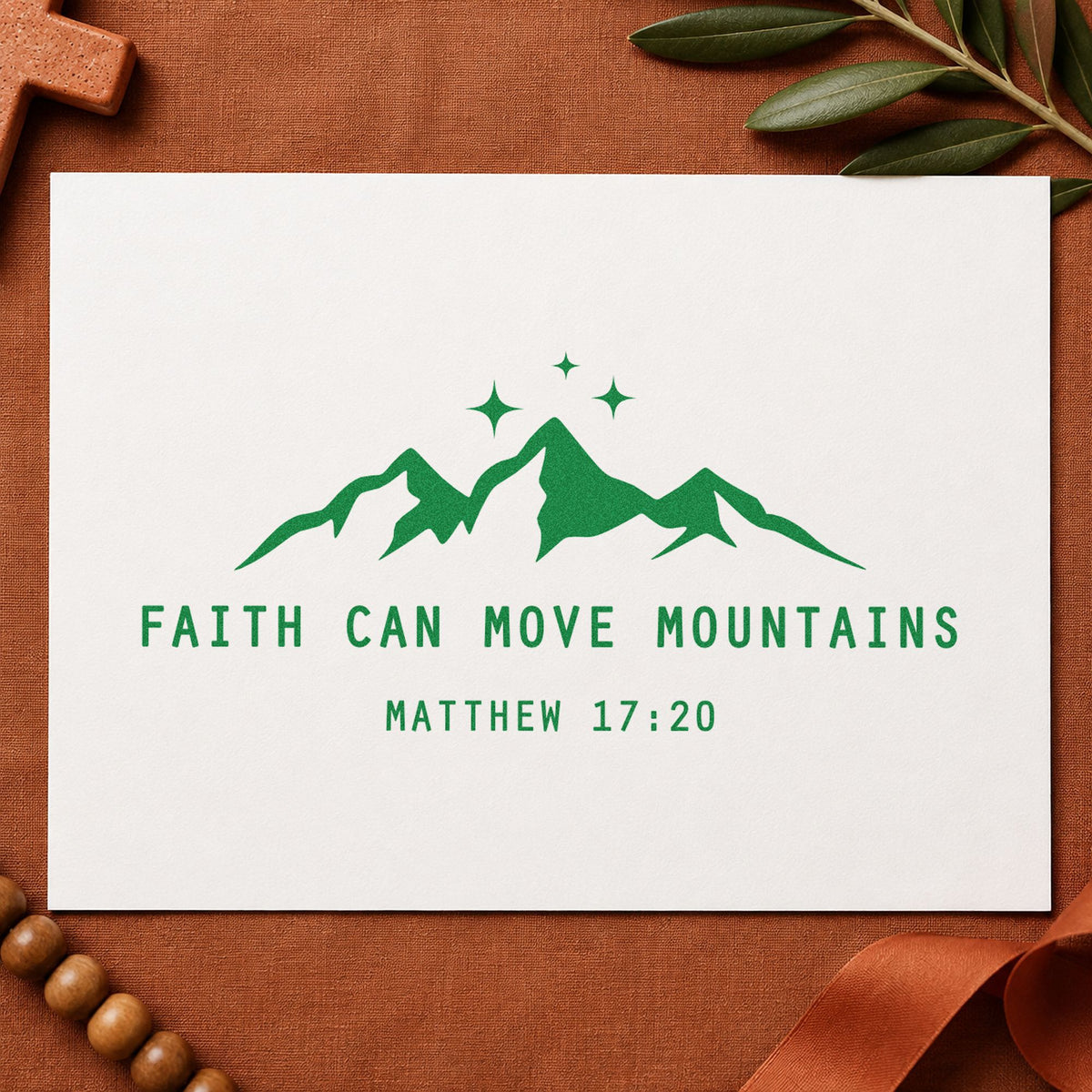 Faith Can Move Mountains craft stamp imprint in green ink on a handmade project, one idea being framed cabin art.