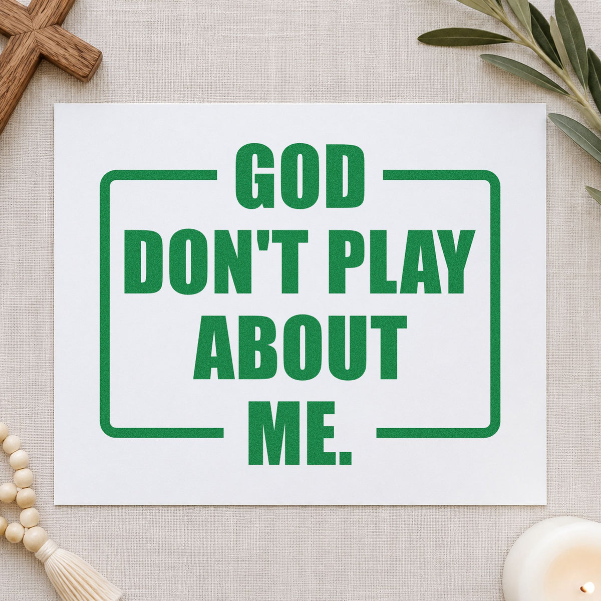 God Don't Play About Me craft stamp imprint in green ink on a handmade project, one idea being statement tees.