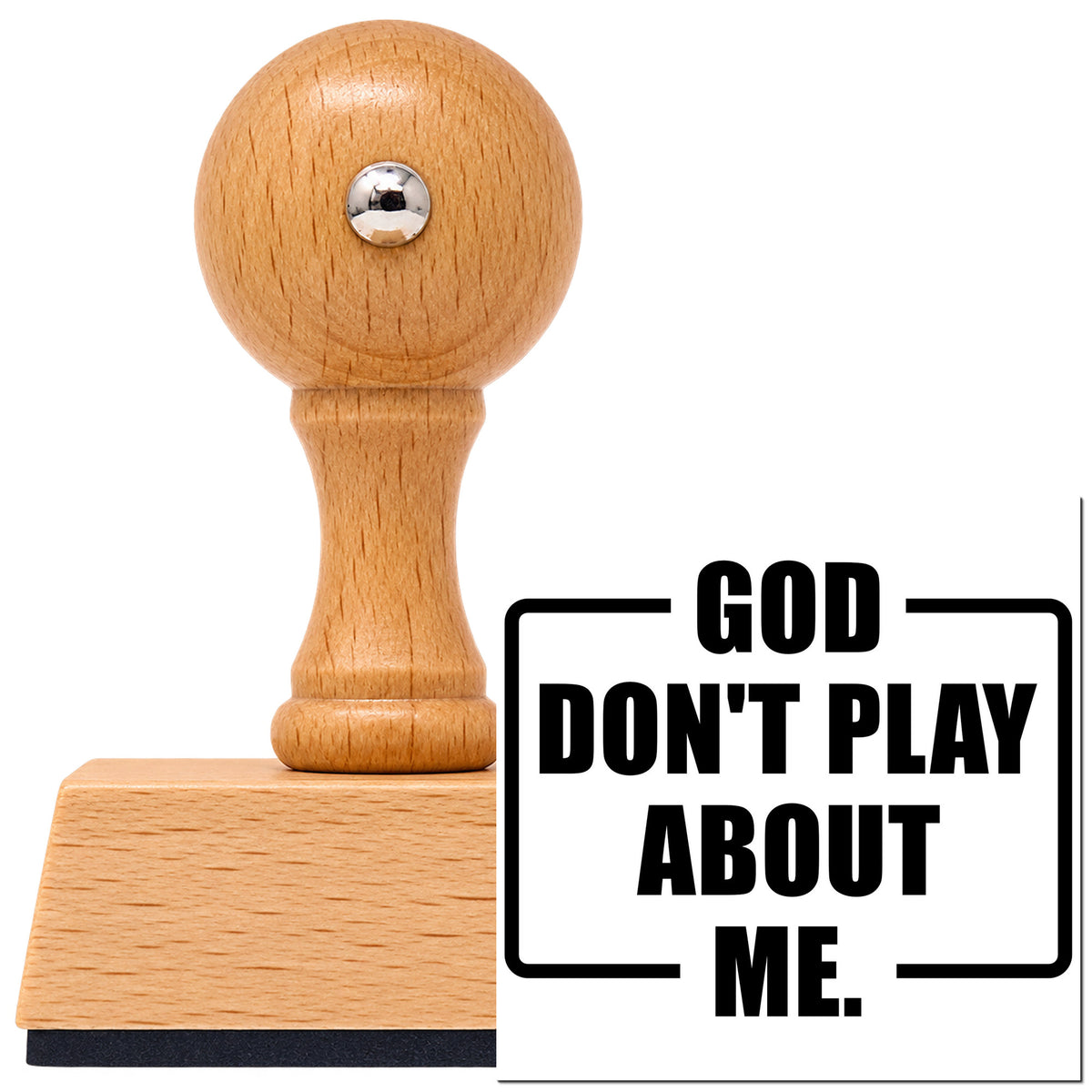 God Don't Play About Me Vintage Pro rubber stamp in European beech wood with a round knob handle, shown beside its black imprint.