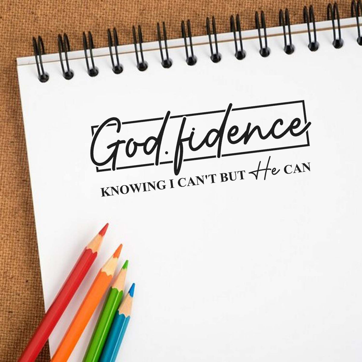 Godfidence Script Framed Lettering Premium Wooden Stamp - Vintage Pro imprint stamped in black ink. Large "Godfidence" script crosses a rectangular outline above "Knowing I can't but he can."