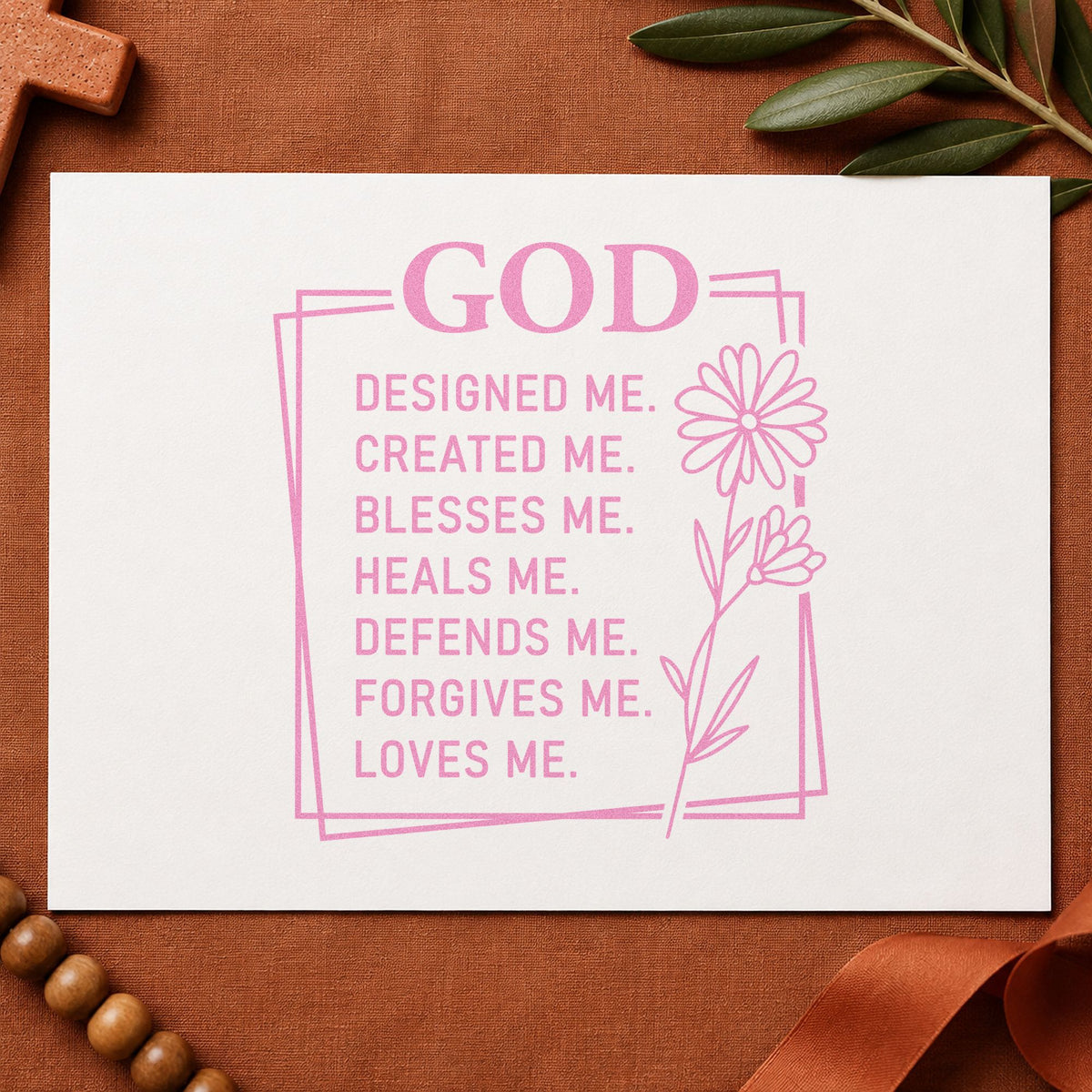 God Designed Me craft stamp in purple ink on cardstock, an easy option for kids' room wall art.