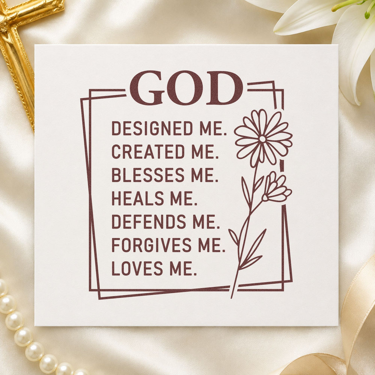 God Designed Me rubber stamp printed in brown ink, ready for baby book pages and similar paper crafts.