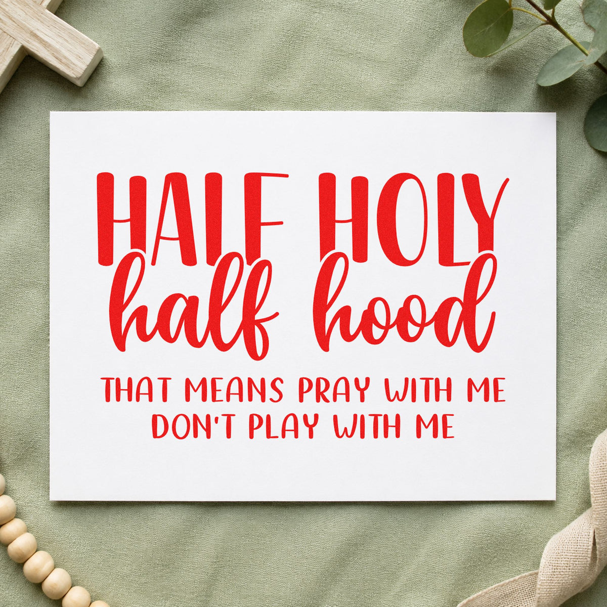 Half Holy Half Hood rubber stamp shown in red ink, stamped for projects such as fridge magnets.