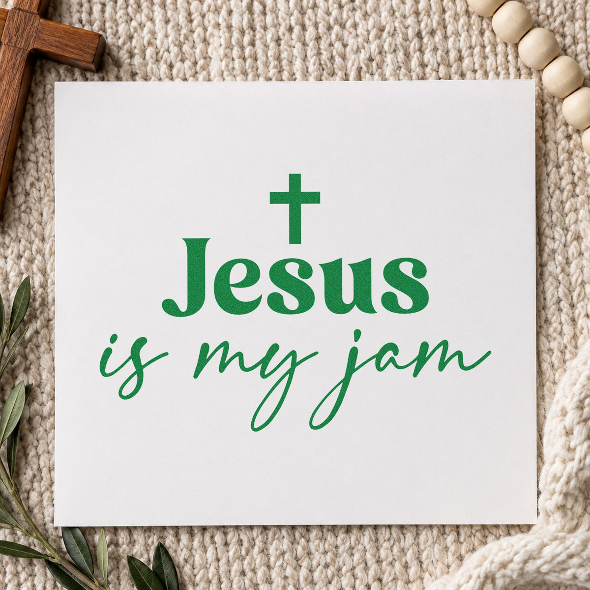 Jesus Is My Jam Script craft stamp imprint in green ink on a handmade project, one idea being choir folder covers.