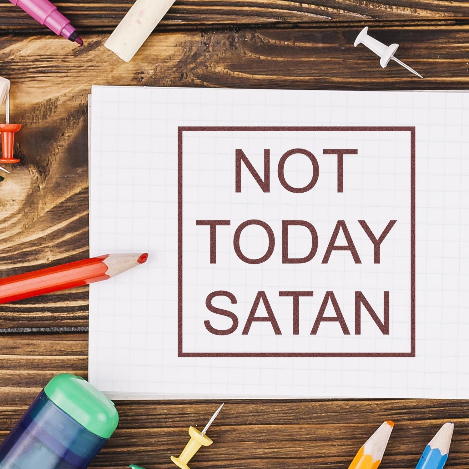 Not Today Satan rubber stamp design on notebook, bold sarcastic quote for planners, crafting, and office organization.