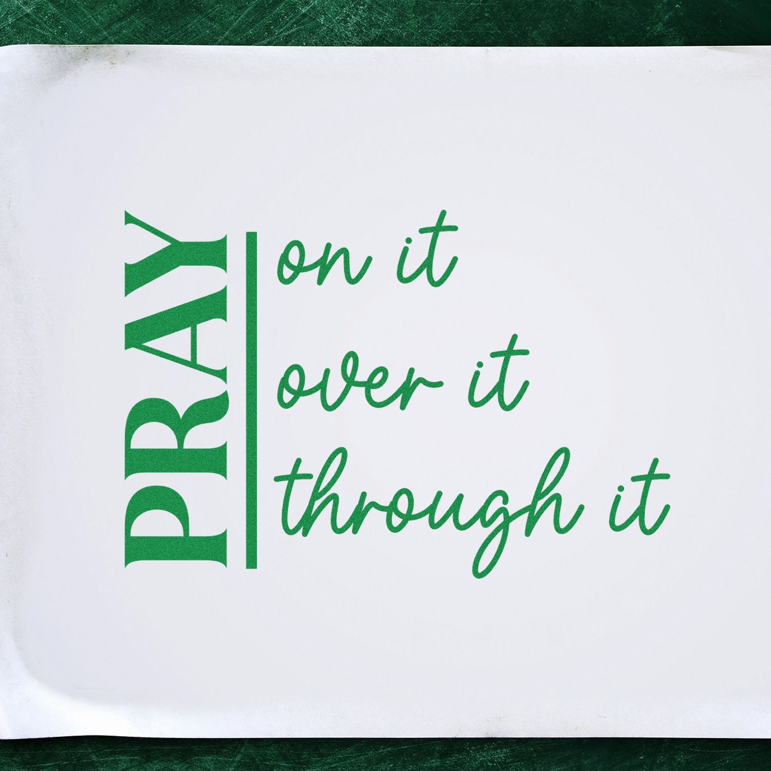 Christian prayer rubber stamp design with green text reading Pray on it, over it, through it.