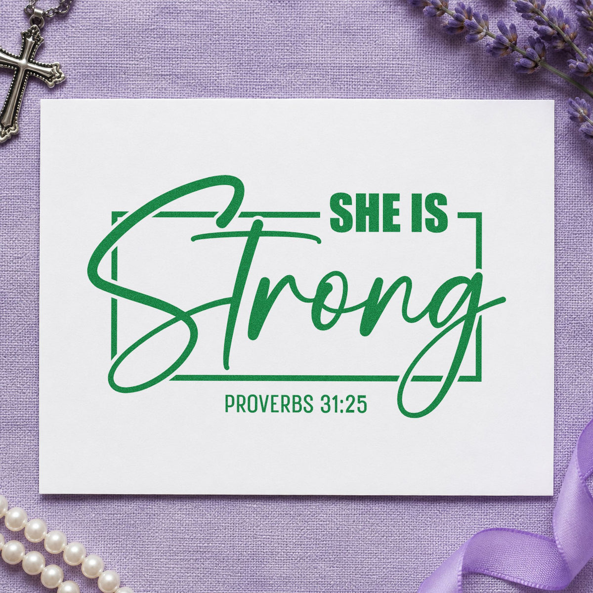 She Is Strong Script craft stamp imprint in green ink on a handmade project, one idea being women's retreat tees.