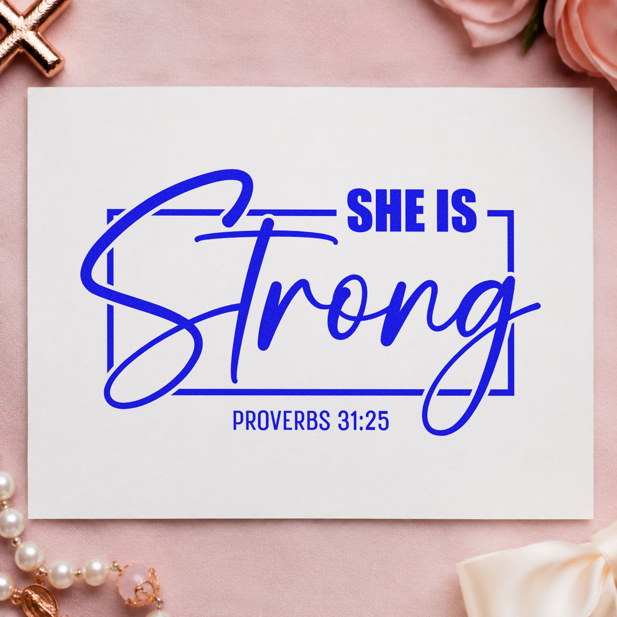 She Is Strong Script craft stamp in blue ink on cardstock, an easy option for canvas totes.
