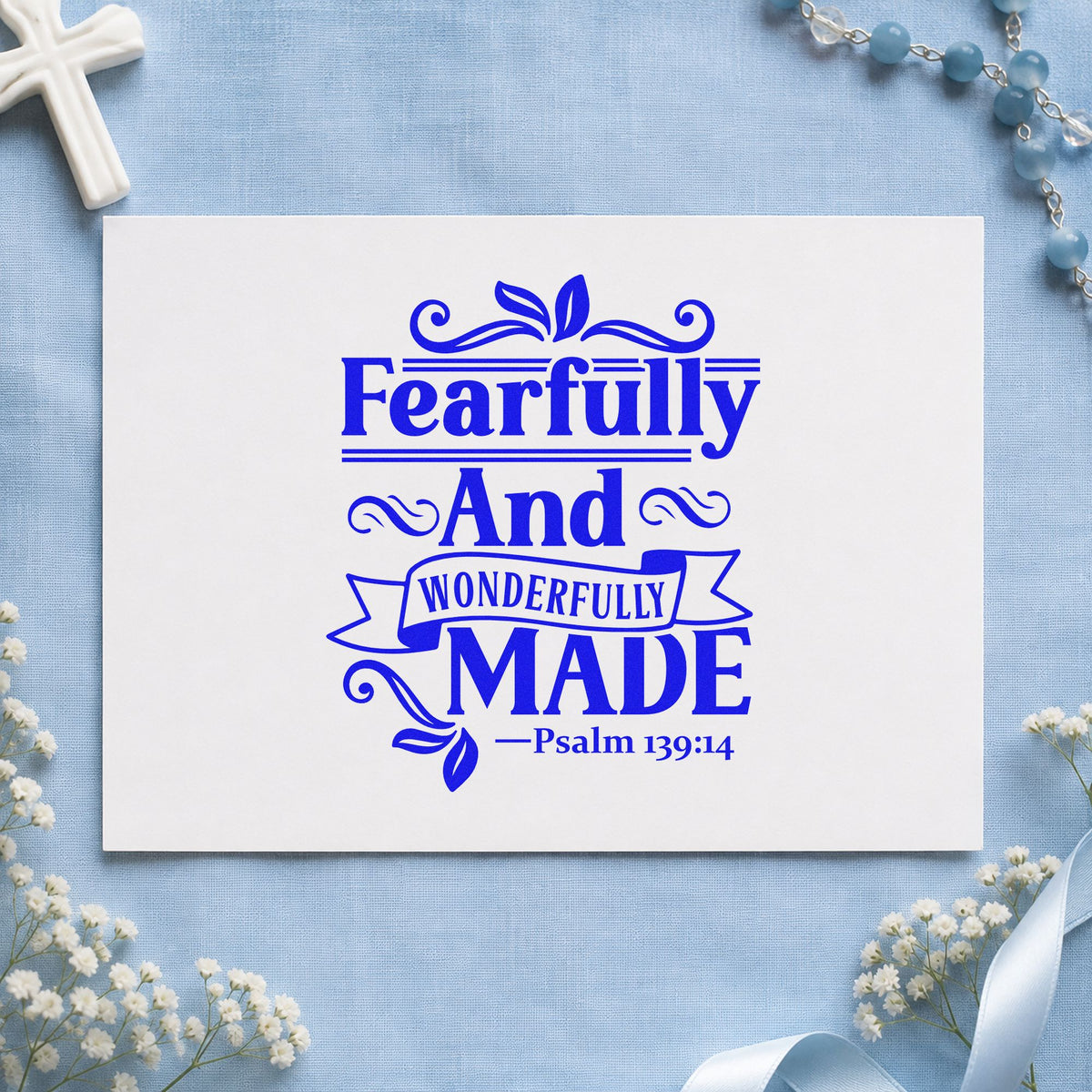 Fearfully and Wonderfully Made craft stamp in blue ink on cardstock, an easy option for onesie stamping.