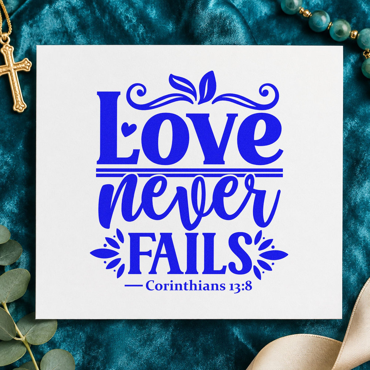 Love Never Fails craft stamp in blue ink on cardstock, an easy option for favor tags.