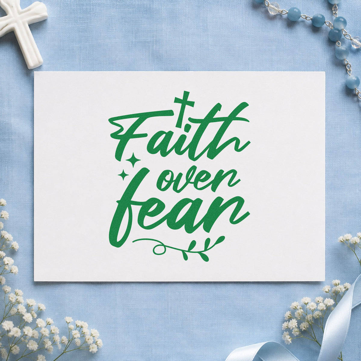 Faith over Fear Flourish craft stamp imprint in green ink on a handmade project, one idea being kids' first day notes.