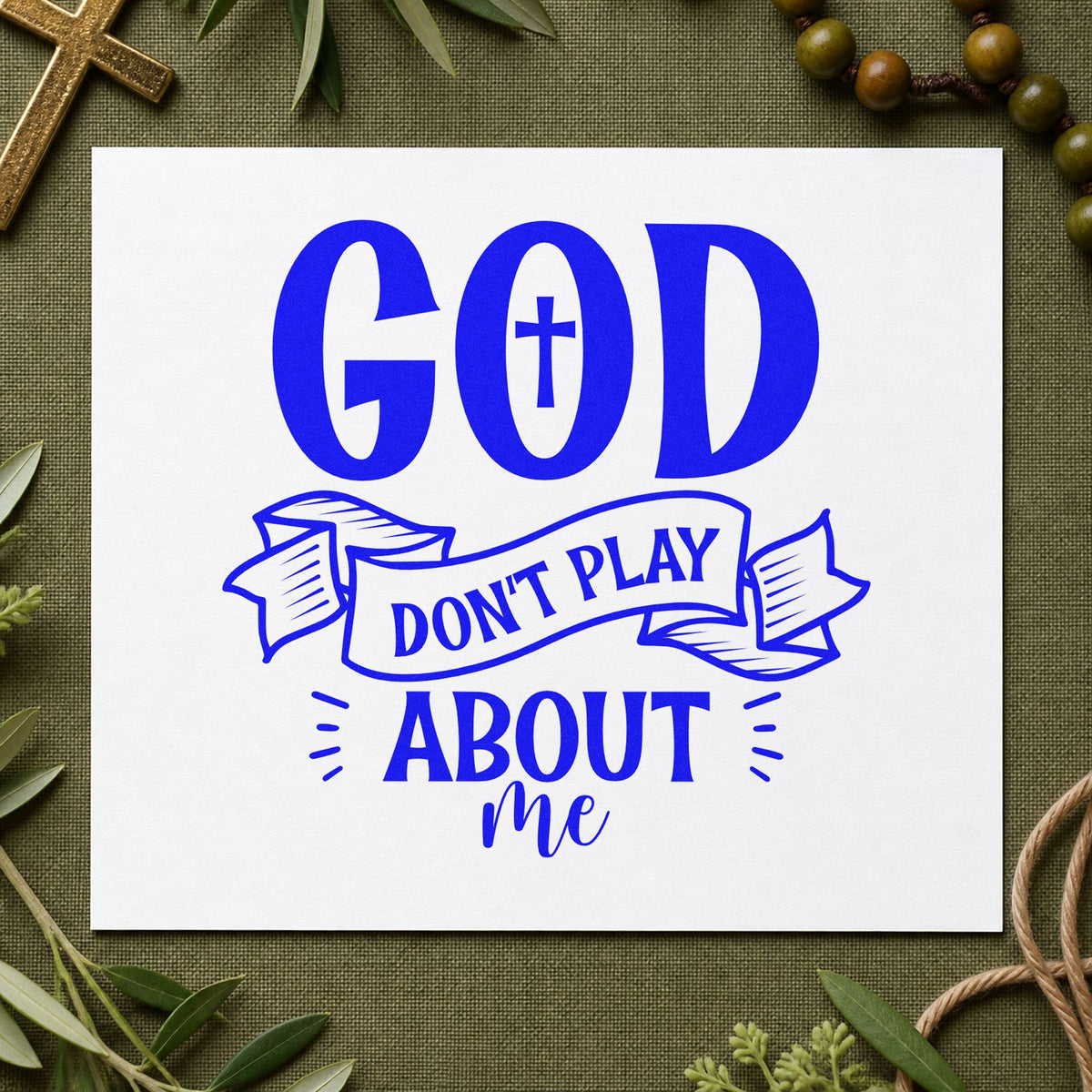 God Don't Play Ribbon craft stamp in blue ink on cardstock, an easy option for canvas totes.