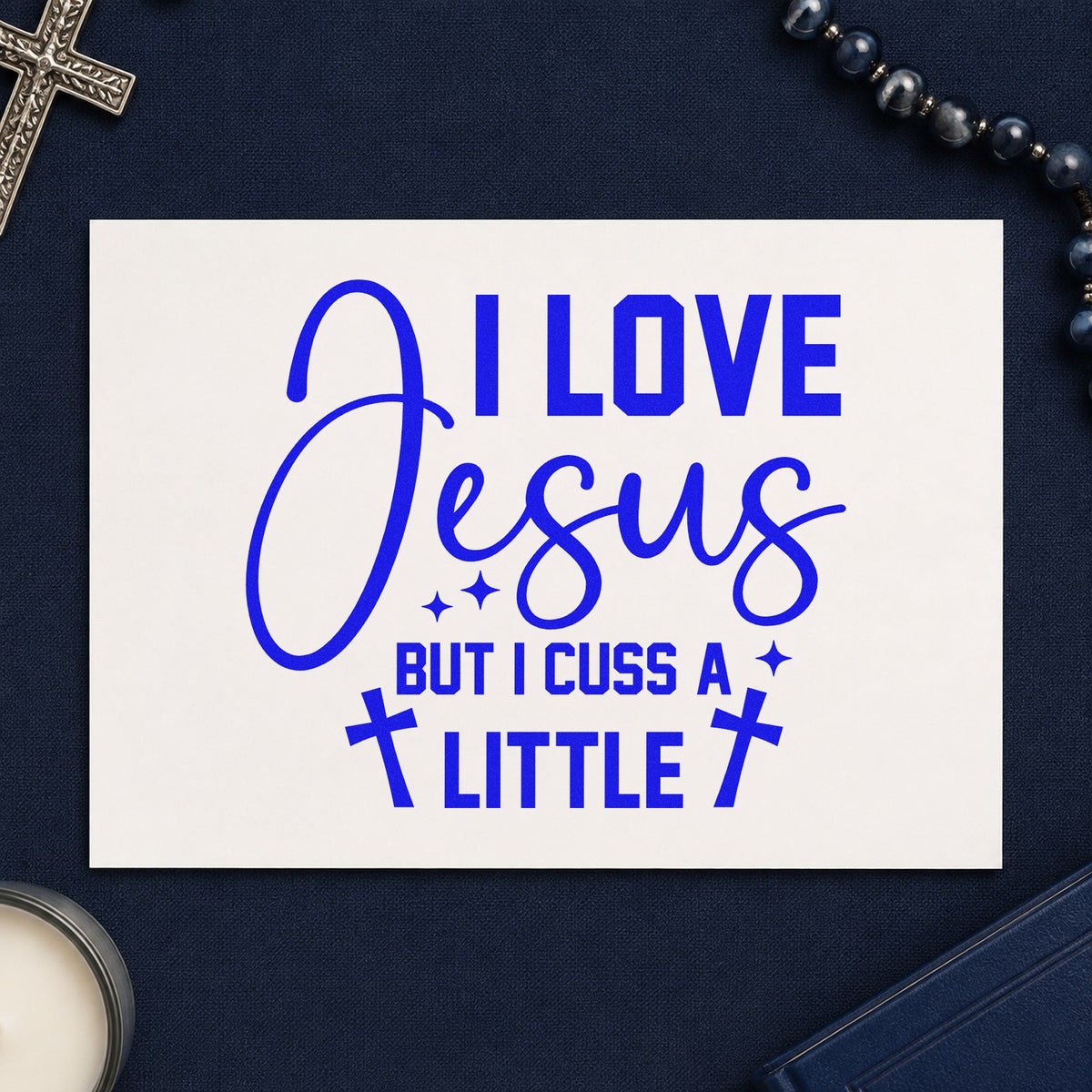 I Love Jesus but Cuss craft stamp imprinted in blue ink on paper, a design suited to travel mug notes.