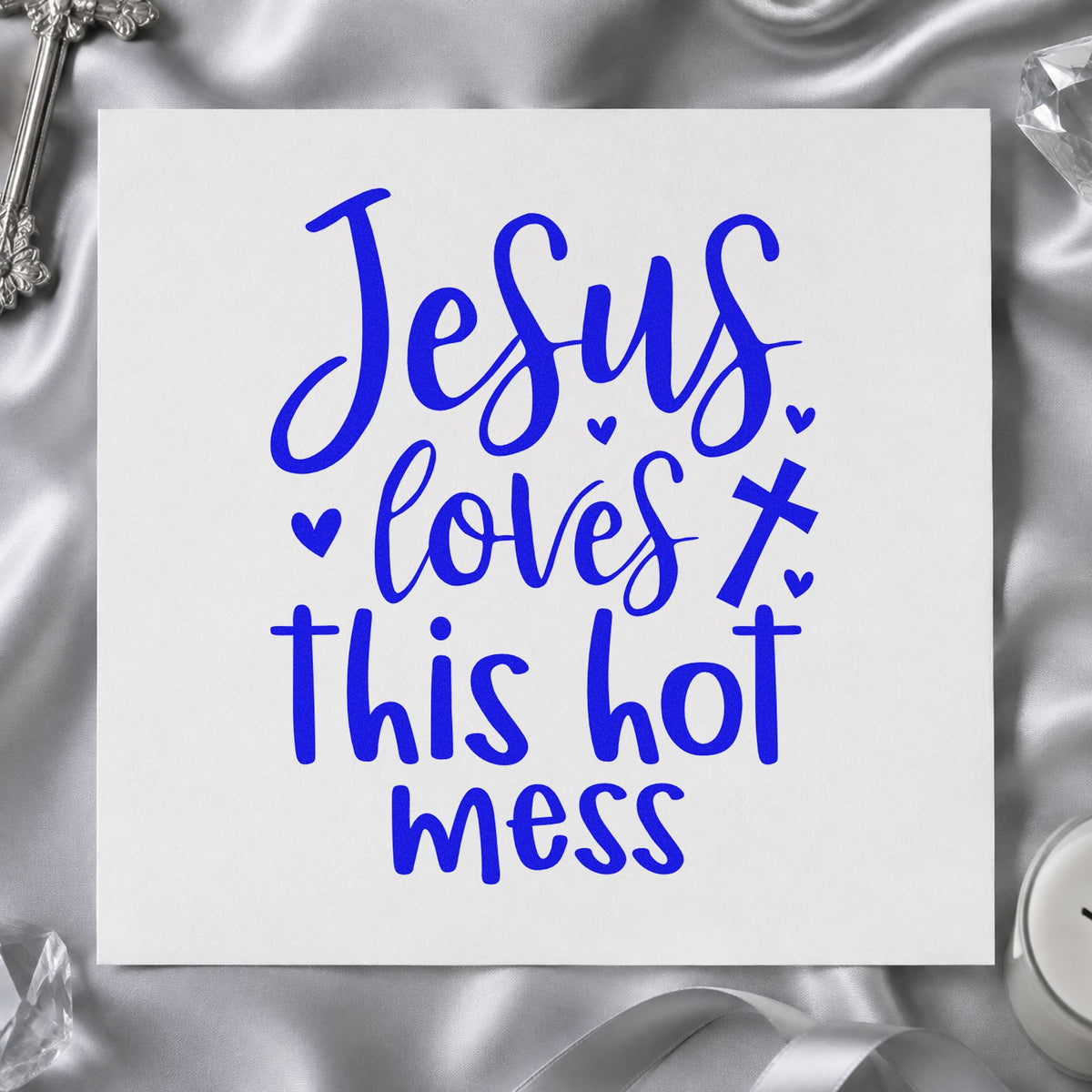 Jesus Loves This Hot Mess craft stamp imprinted in blue ink on paper, a design suited to birthday gift tags.