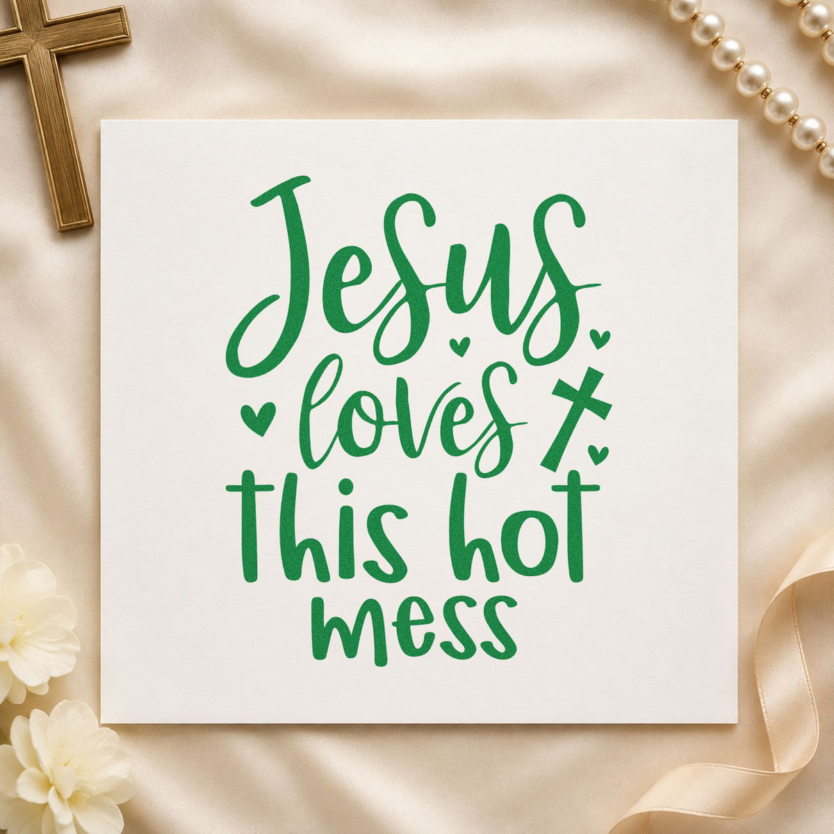 Jesus Loves This Hot Mess craft stamp imprint in green ink on a handmade project, one idea being planner cover stamping.