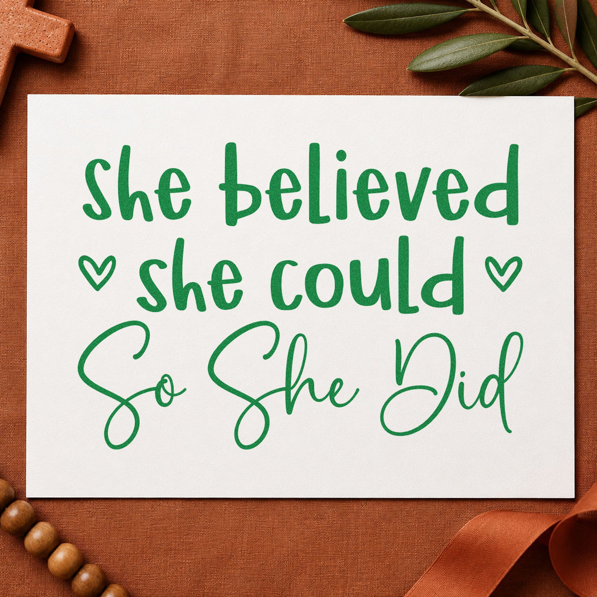 She Believed She Could craft stamp imprint in green ink on a handmade project, one idea being journal cover stamping.