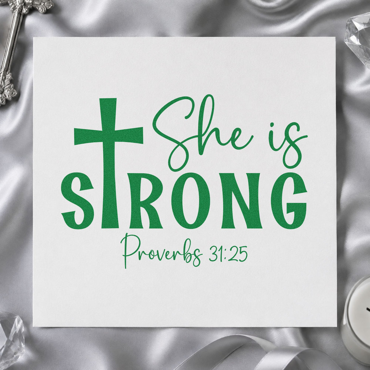 She Is Strong Cross craft stamp imprint in green ink on a handmade project, one idea being framed bedroom art.