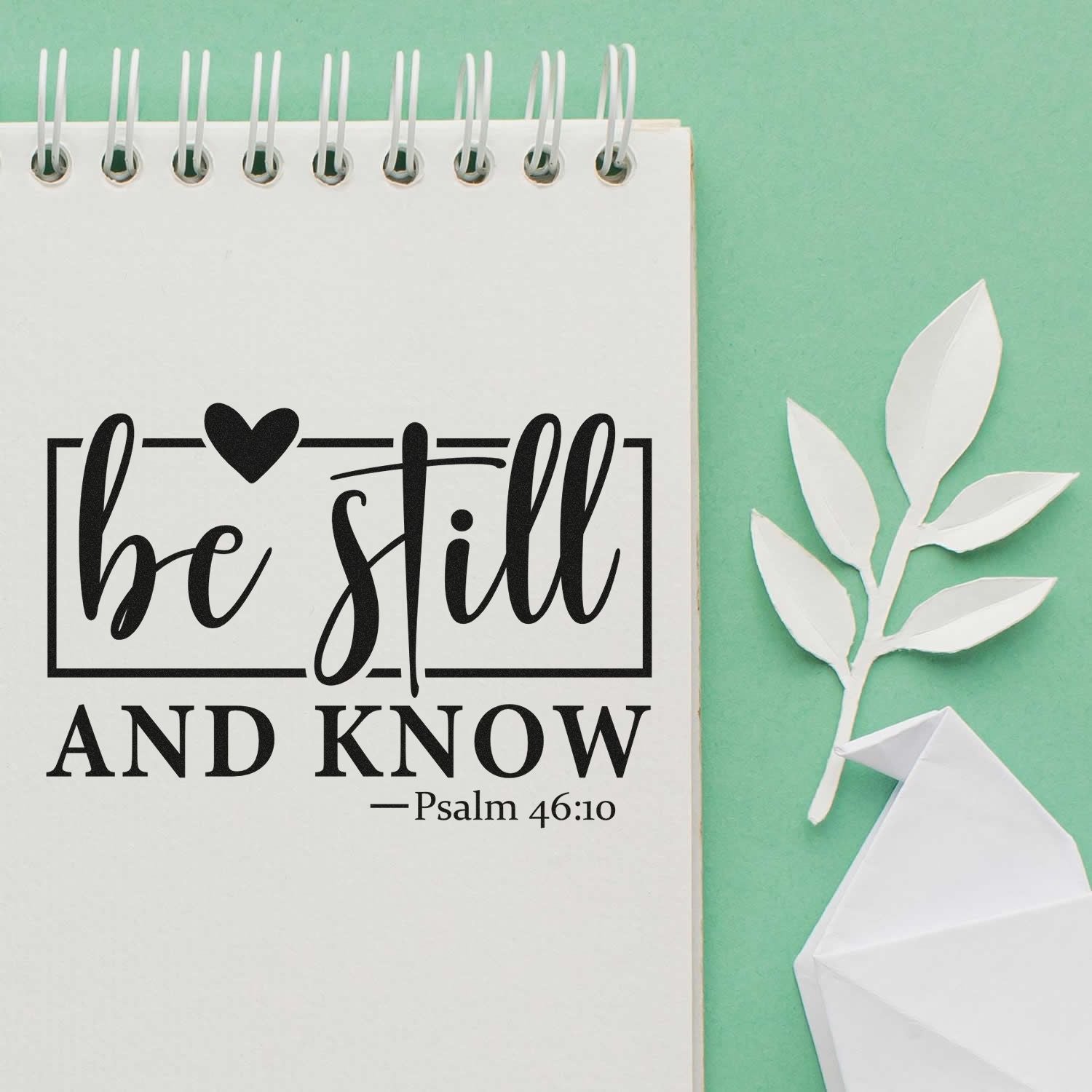 Christian rubber stamp design with Psalm 46:10 quote, Be still and know, for faith journaling and Bible crafts.