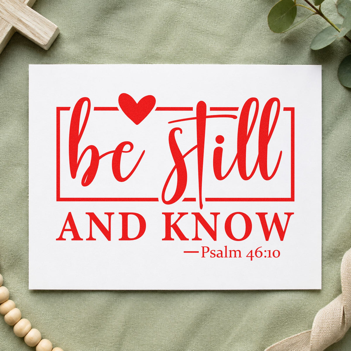 Be Still Heart Frame rubber stamp shown in red ink, stamped for projects such as journal cover stamping.