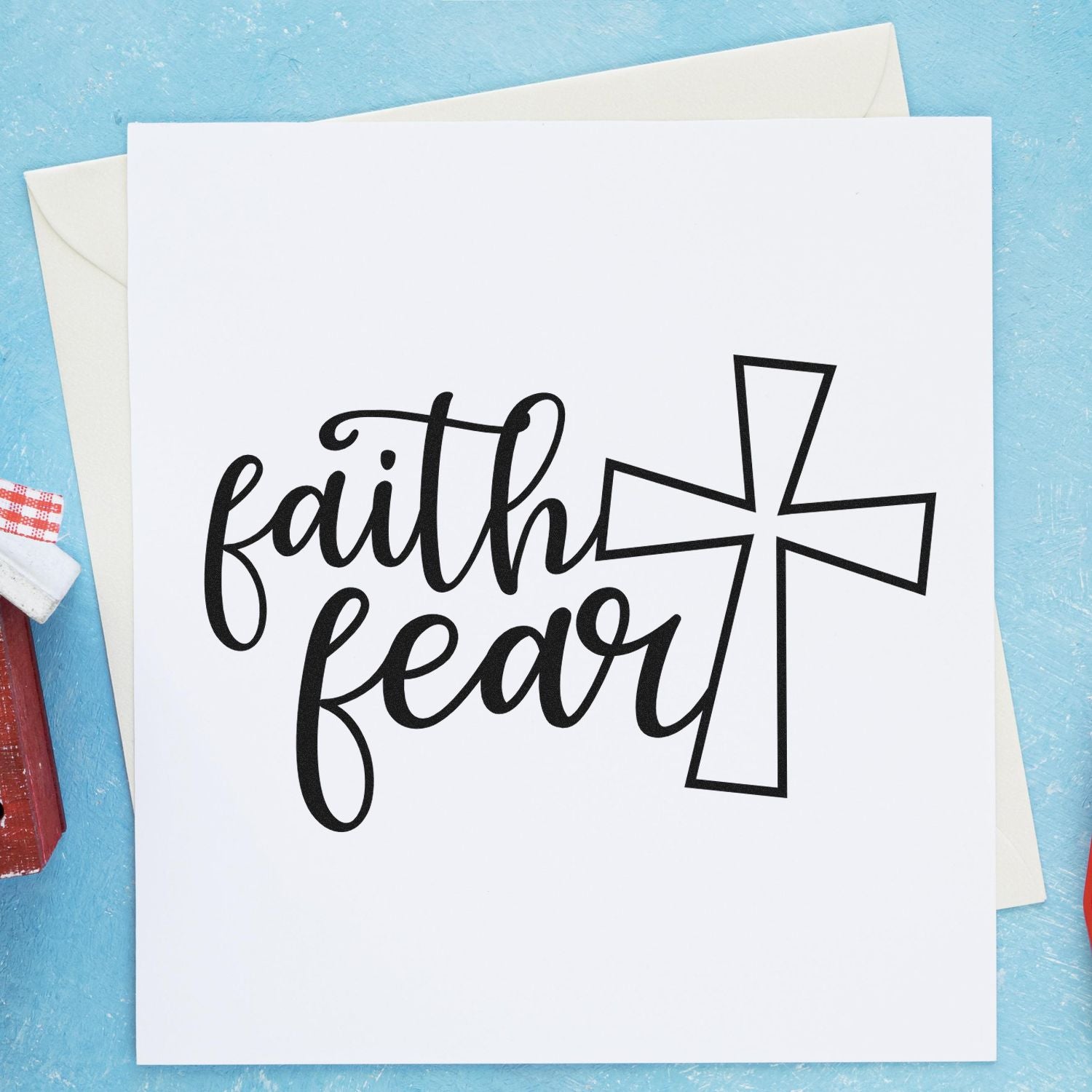 Faith over fear rubber stamp design with cross, ideal for Christian card making and handmade paper crafts.