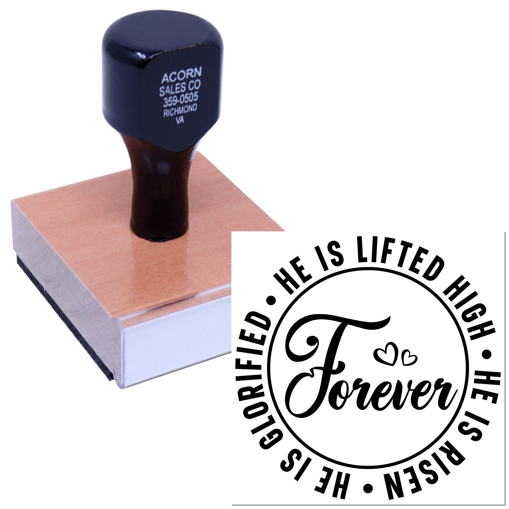 Custom rubber stamp with religious message imprint reading He is lifted high, glorified forever on a wooden stamp block.