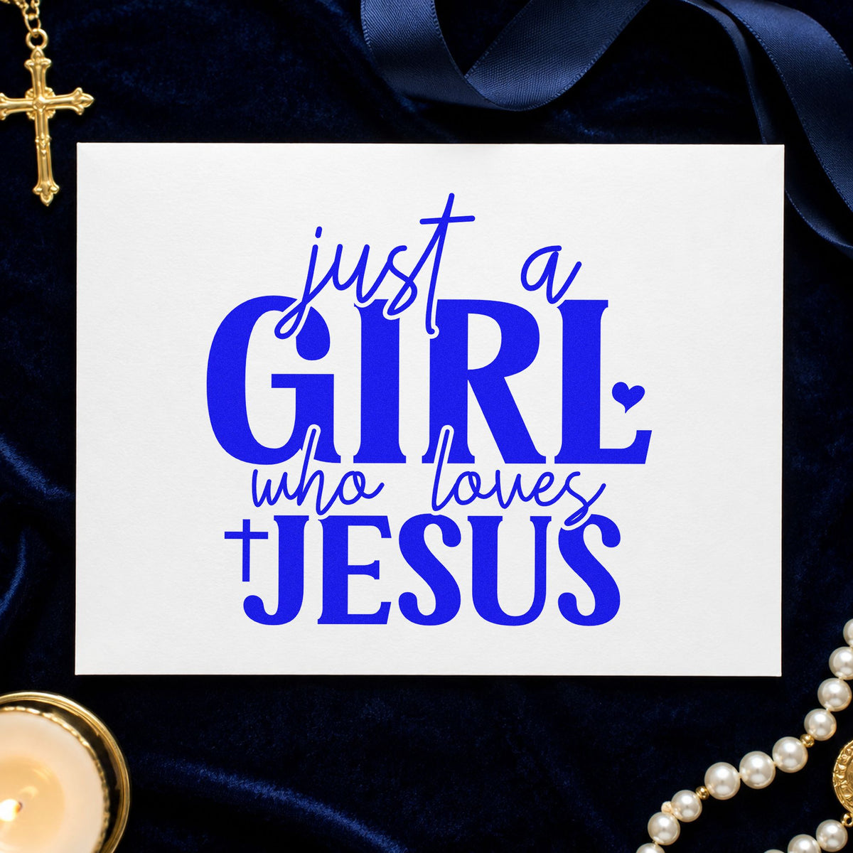 Just a Girl Who Loves Jesus craft stamp imprinted in blue ink on paper, a design suited to journal cover stamping.