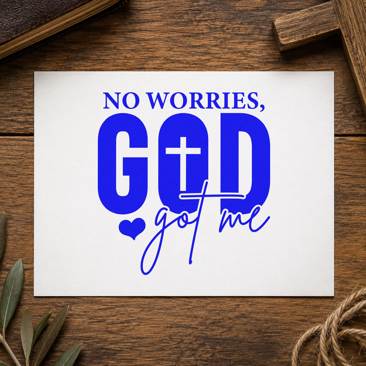 No Worries God Got Me craft stamp imprinted in blue ink on paper, a design suited to travel luggage tags.