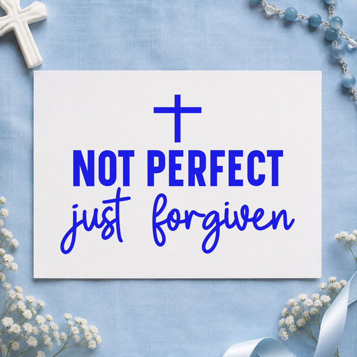 Not Perfect Just Forgiven craft stamp in blue ink on cardstock, an easy option for tee transfers.