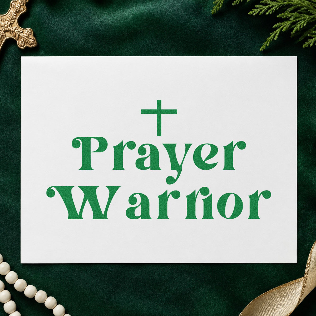 Prayer Warrior craft stamp imprint in green ink on a handmade project, one idea being prayer shawl tags.