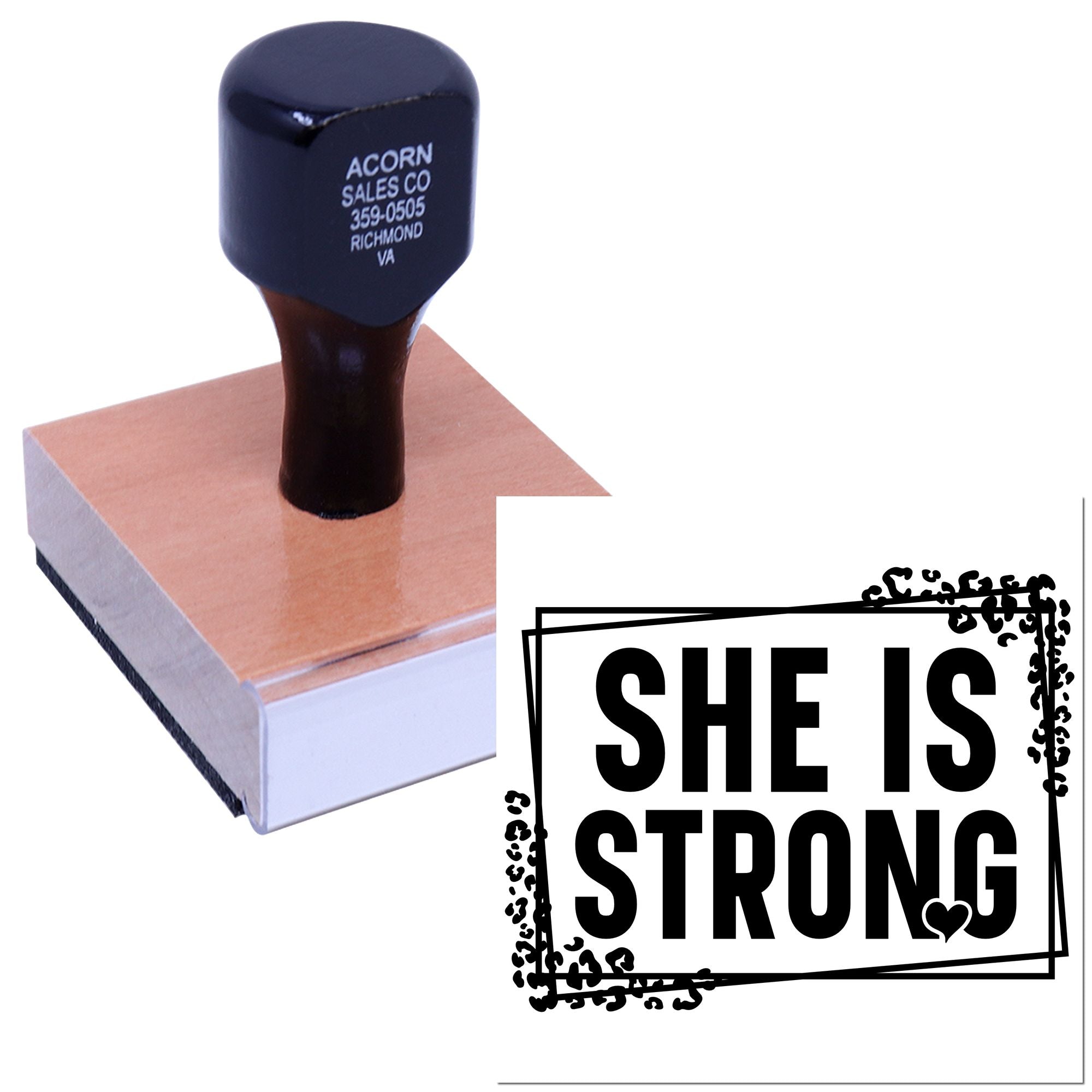 Custom rubber stamp with She Is Strong design on wooden block, ideal for inspirational crafts, card making, and scrapbooking.