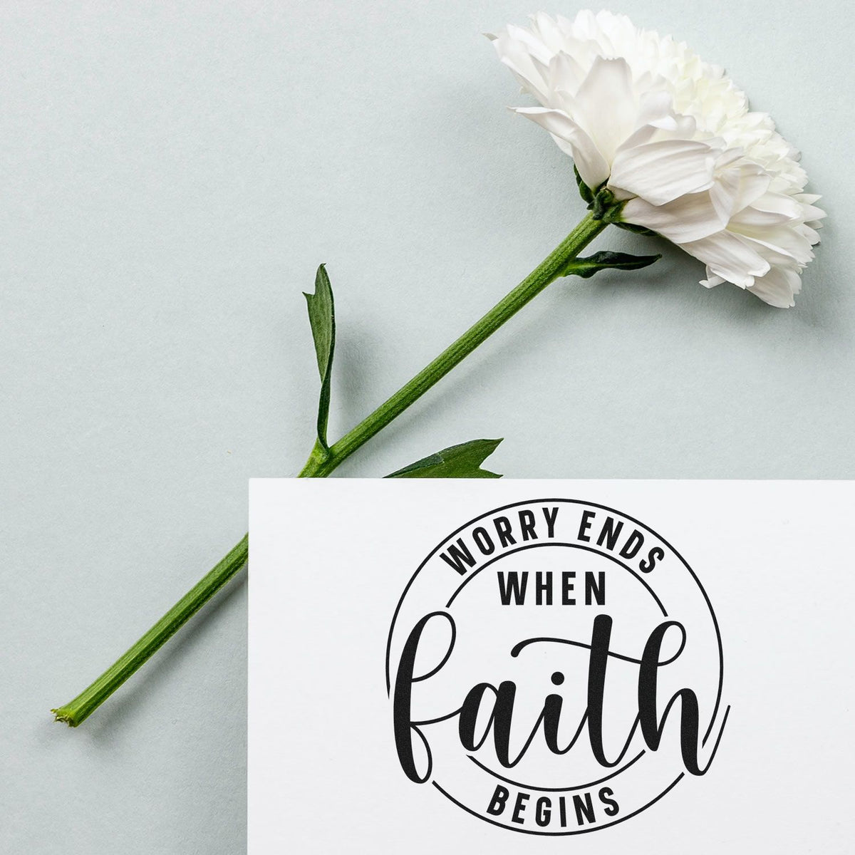 Worry Ends When Faith Begins Premium Wooden Stamp - Vintage Pro imprint stamped in brown ink. A circular outline frames "Worry ends when faith begins," with "Faith" in large script.