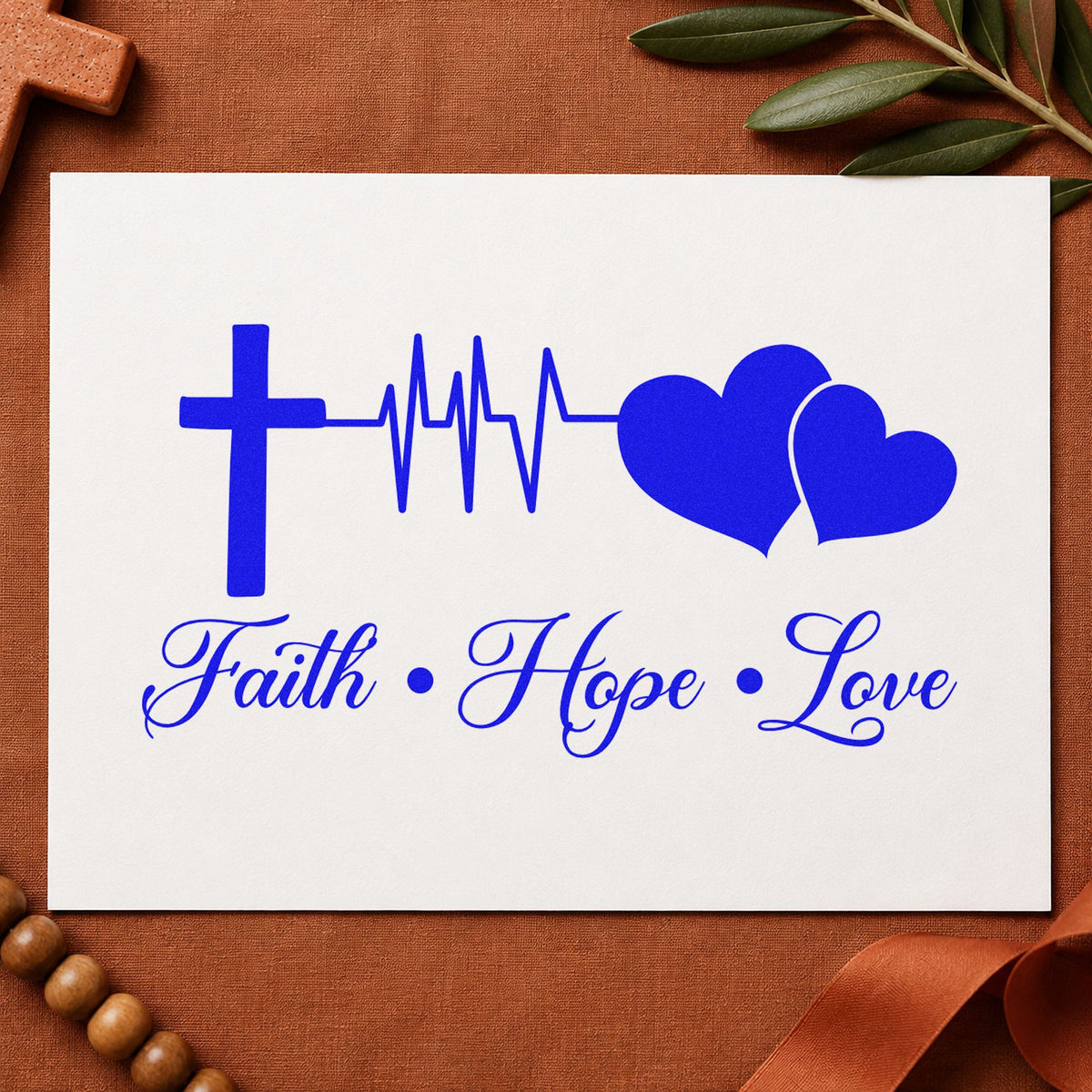 Faith Hope Love Double Heart craft stamp in blue ink on cardstock, an easy option for scrub totes.