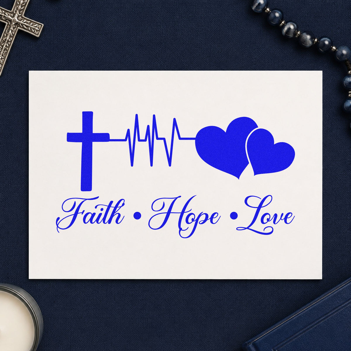 Faith Hope Love Double Heart craft stamp imprinted in blue ink on paper, a design suited to blood drive thank-yous.