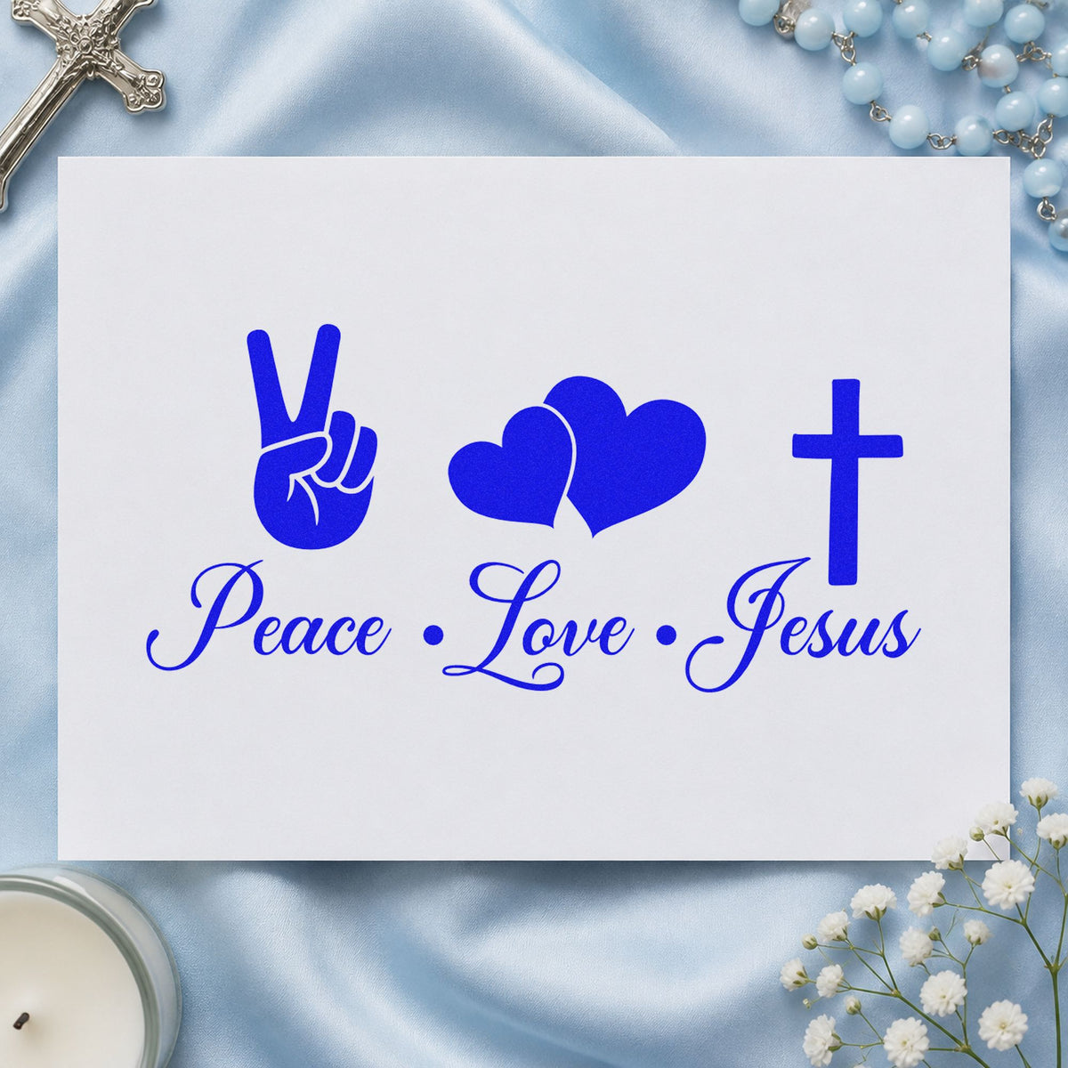 Peace Love Jesus craft stamp imprinted in blue ink on paper, a design suited to youth camp crafts.