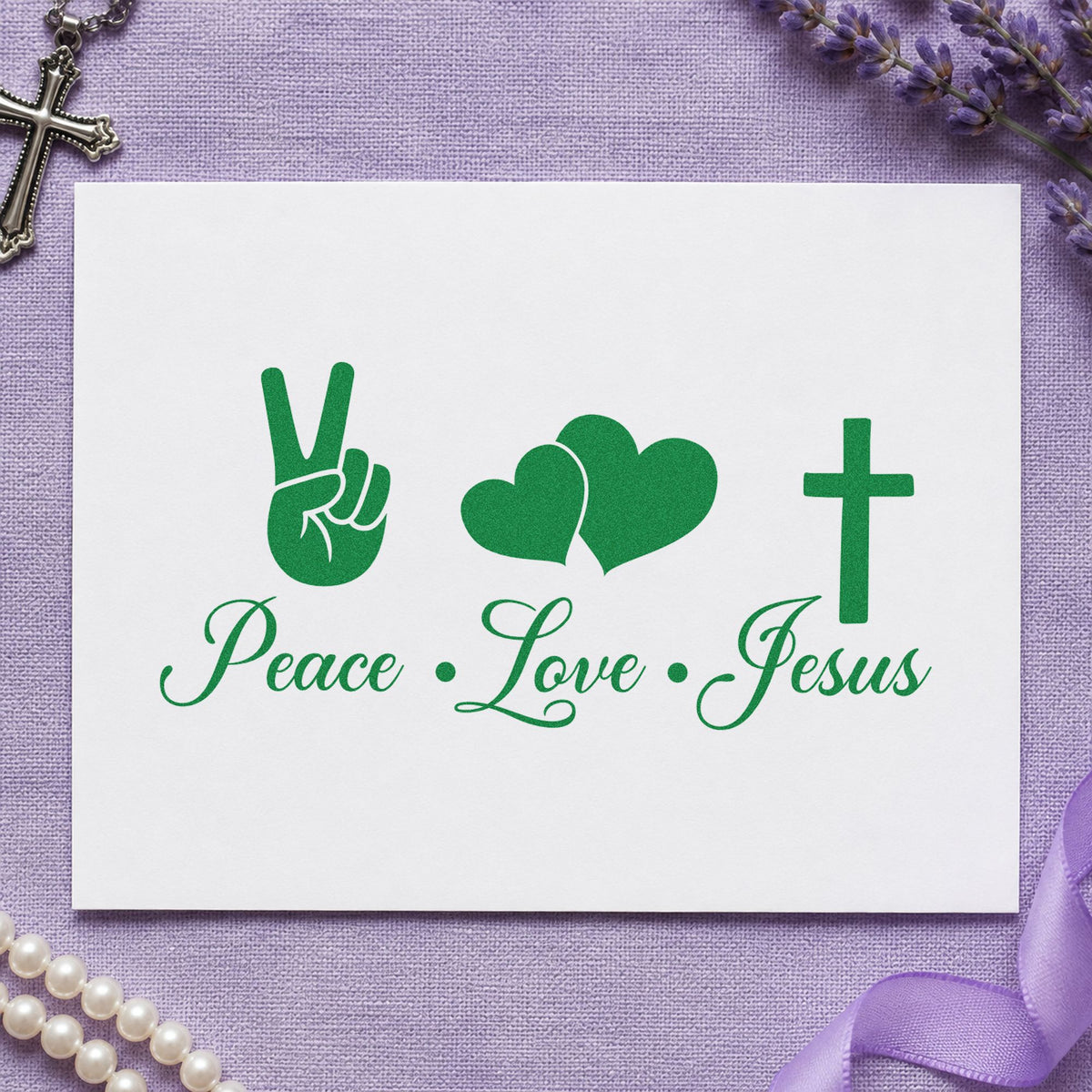 Peace Love Jesus craft stamp imprint in green ink on a handmade project, one idea being guitar case labels.