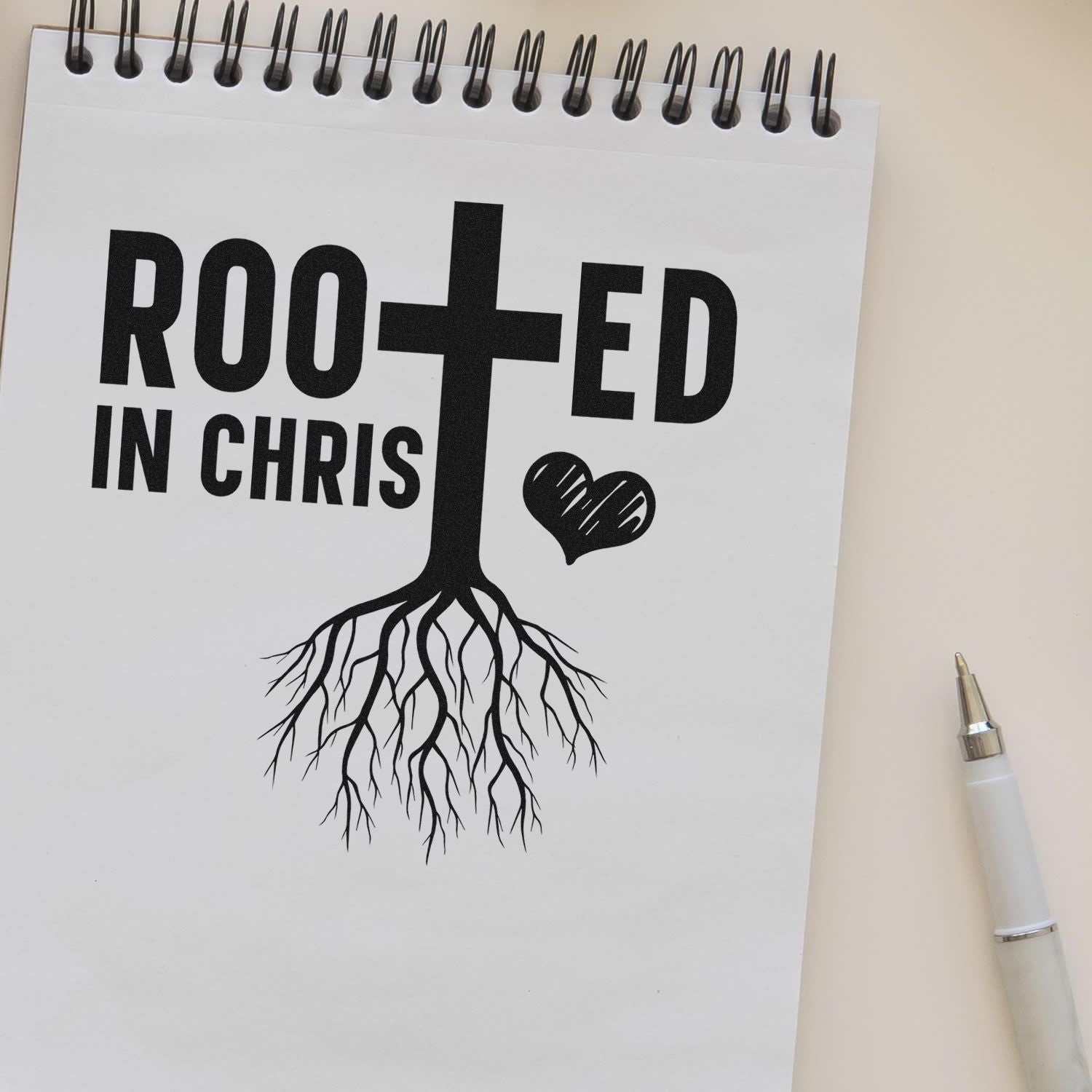 Christian rubber stamp design reading Rooted in Christ with cross, roots, and heart for faith-based crafts.