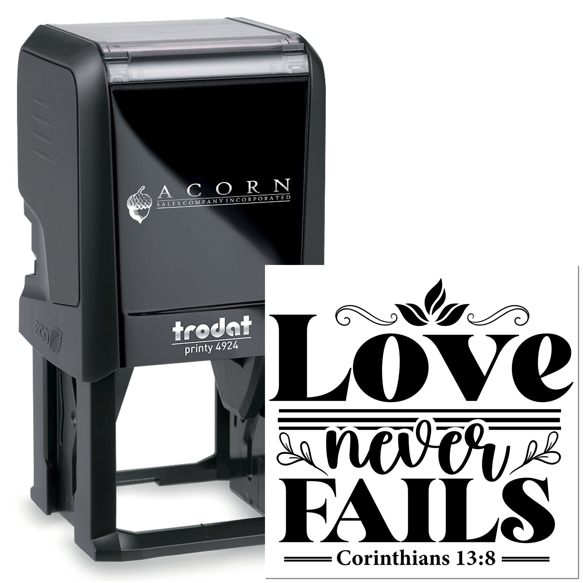 Self-inking Trodat rubber stamp with custom Love Never Fails Corinthians 13:8 personalized religious design.