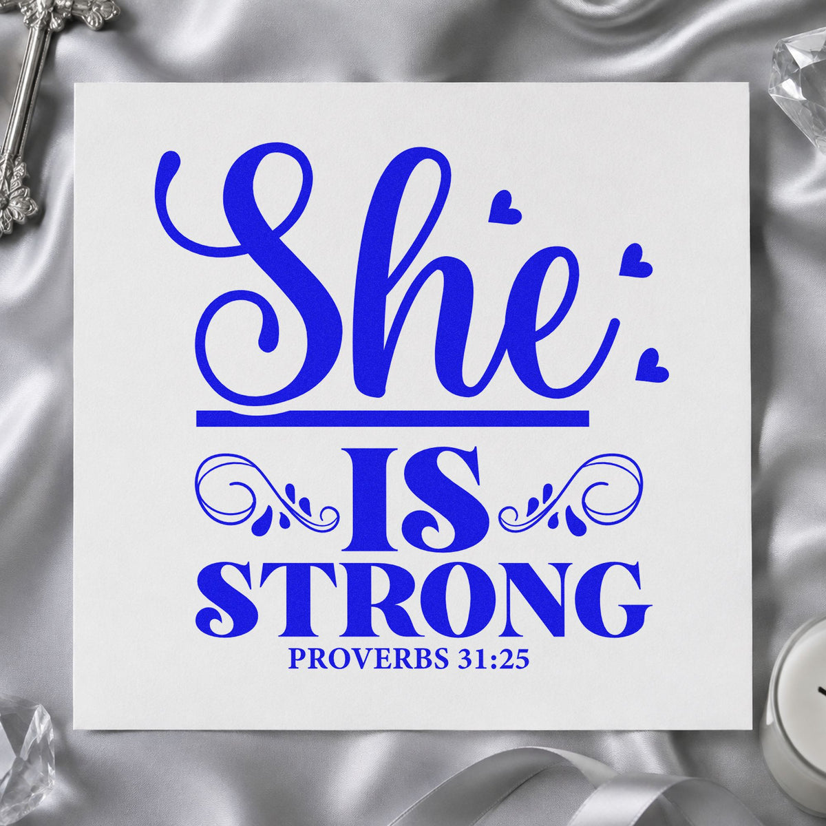 She Is Strong Ornamental craft stamp imprinted in blue ink on paper, a design suited to survivor gift tags.