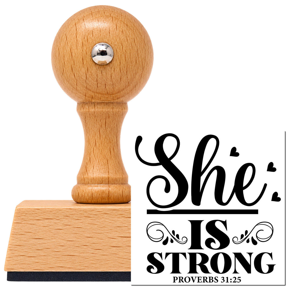 She Is Strong Ornamental Vintage Pro rubber stamp in European beech wood with a round knob handle, shown beside its black imprint.
