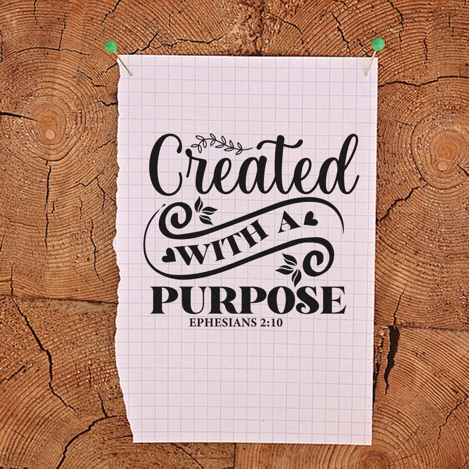 Christian rubber stamp design reading Created with a Purpose with Ephesians 2:10 on pinned graph paper.