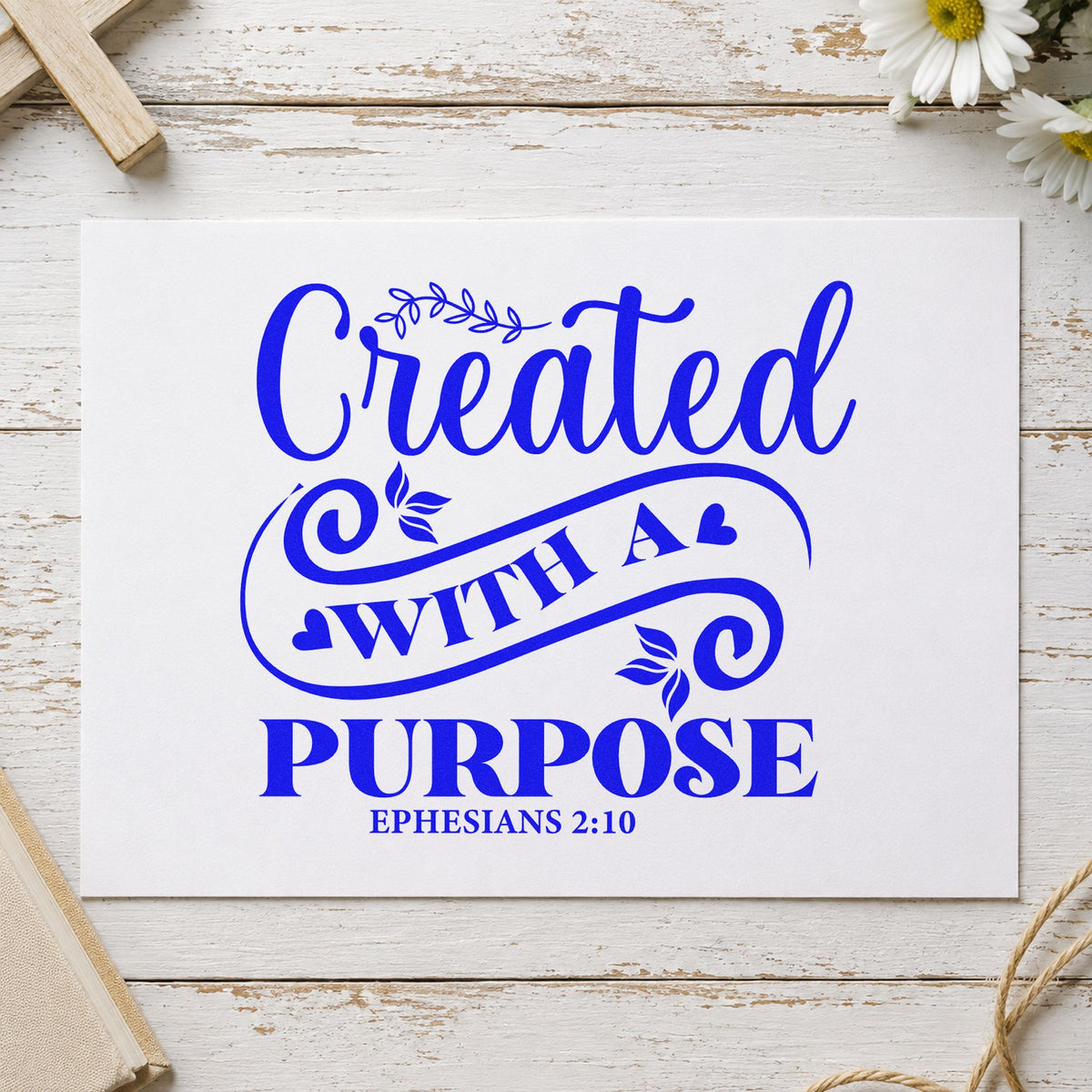Created with a Purpose Flourish craft stamp imprinted in blue ink on paper, a design suited to maker hang tags.