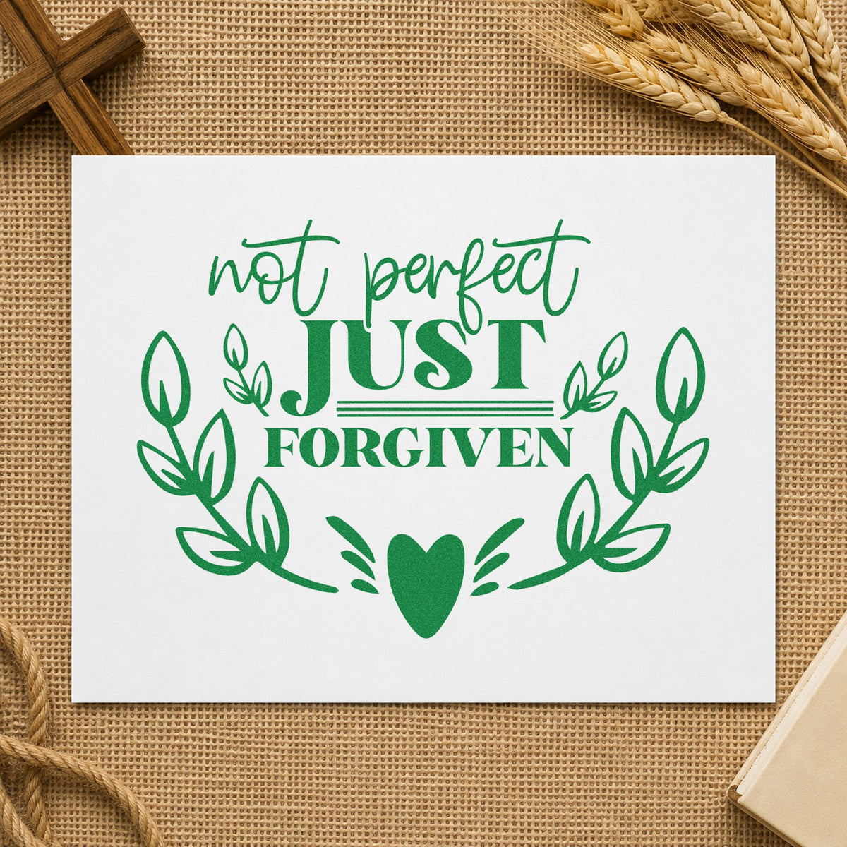 Not Perfect Just Forgiven Wreath craft stamp imprint in green ink on a handmade project, one idea being framed bedroom art.