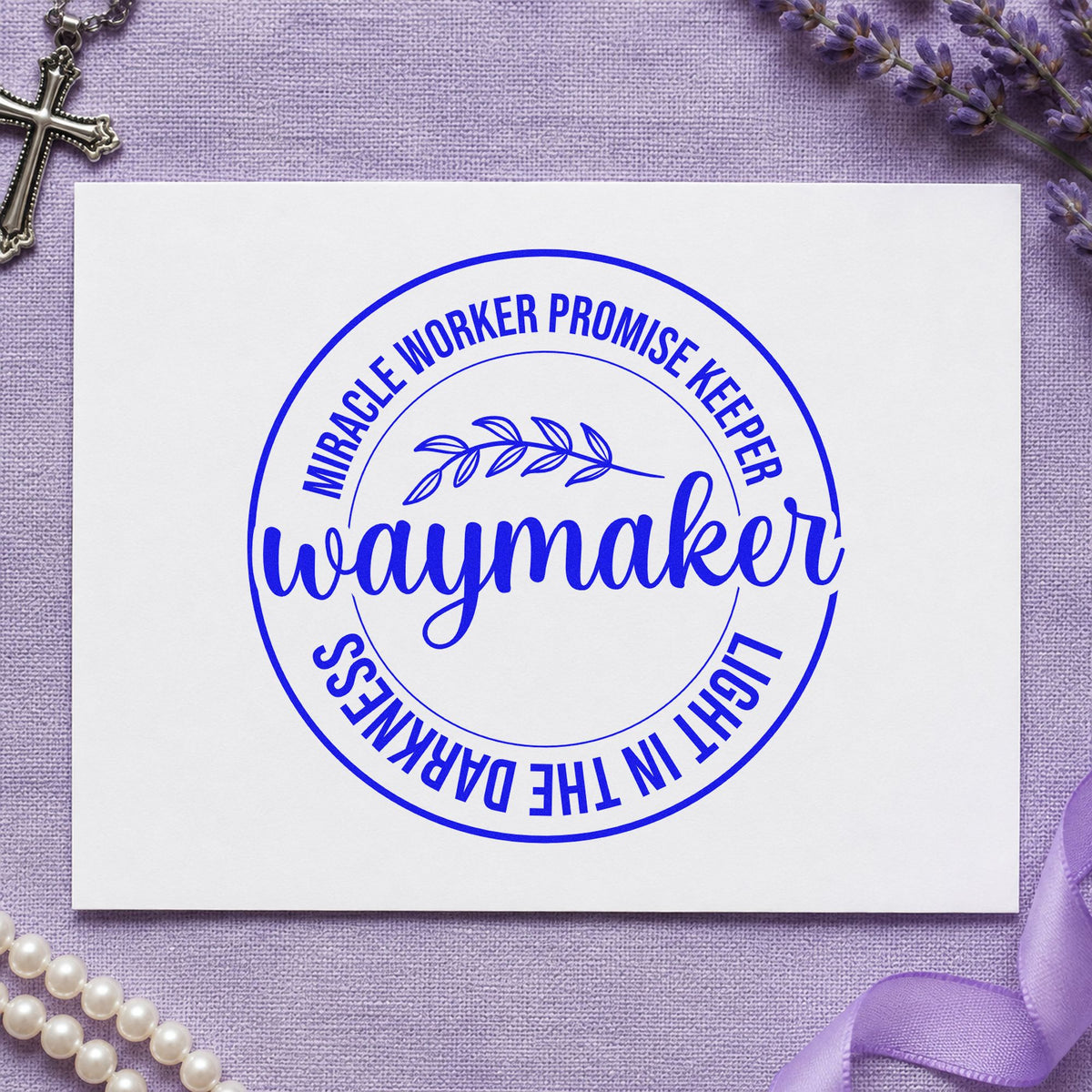 Waymaker Leaf Badge craft stamp imprinted in blue ink on paper, a design suited to tee transfers.