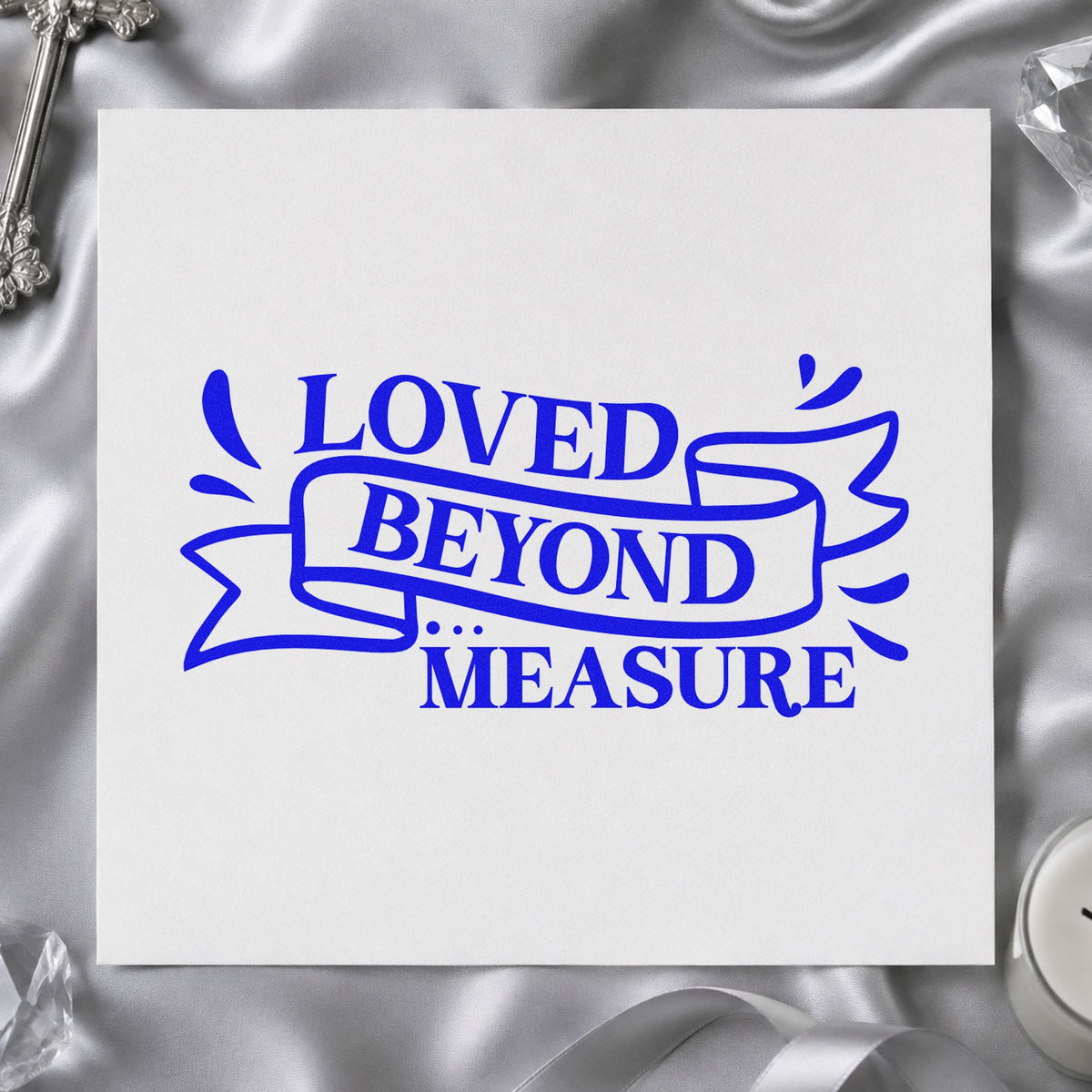 Loved Beyond Measure Ribbon craft stamp imprinted in blue ink on paper, a design suited to valentine cards.