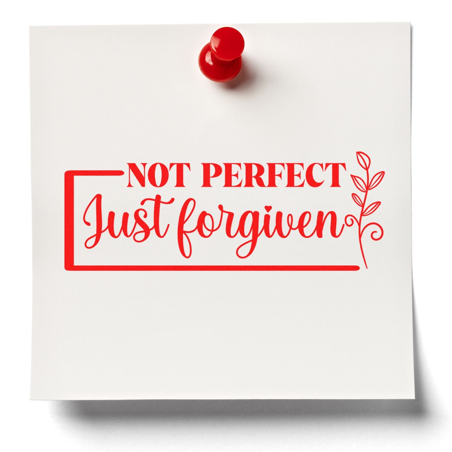 Red rubber stamp design reading Not Perfect Just Forgiven with floral accent on white paper.
