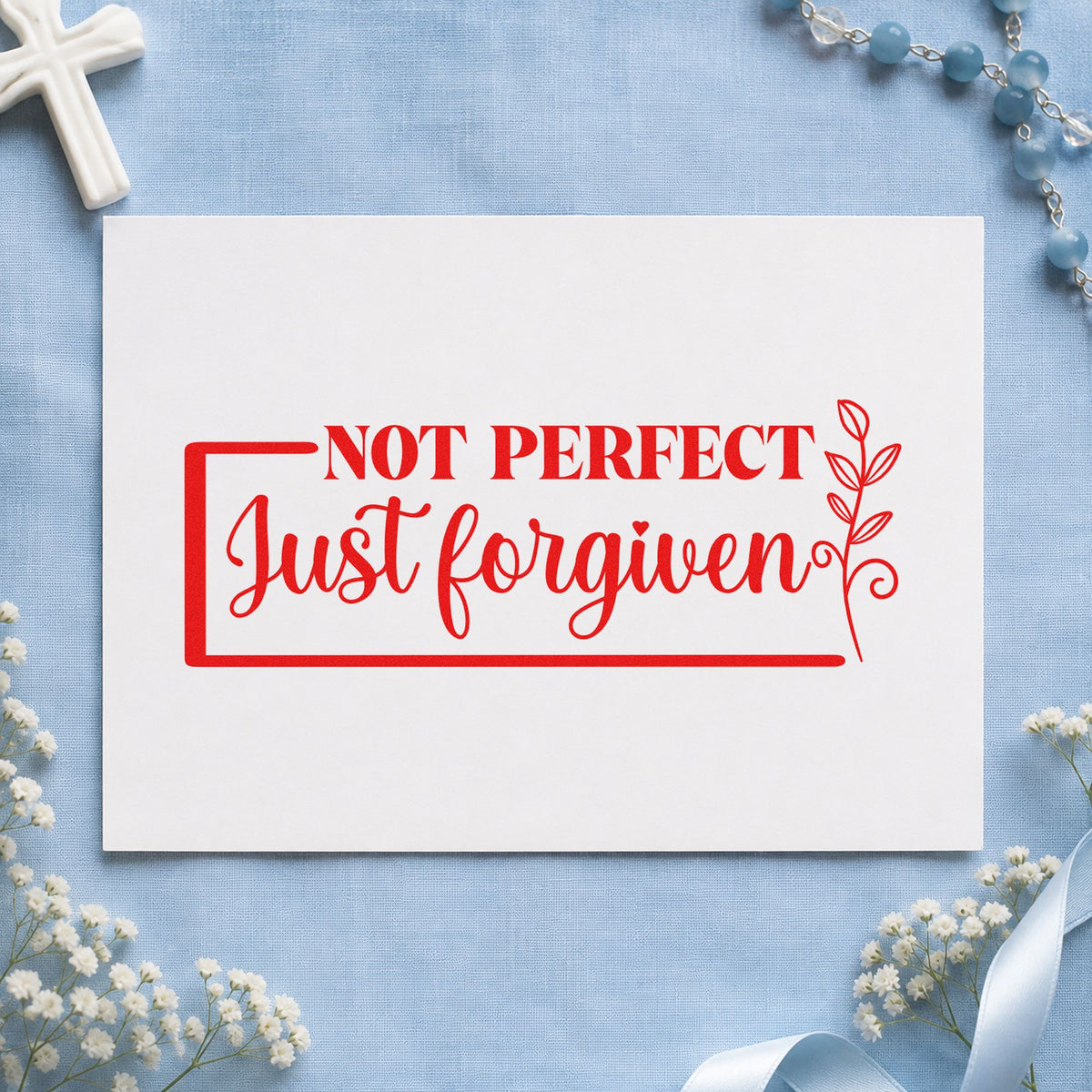 Not Perfect Forgiven Leaf Frame rubber stamp shown in red ink, stamped for projects such as planner cover stamping.
