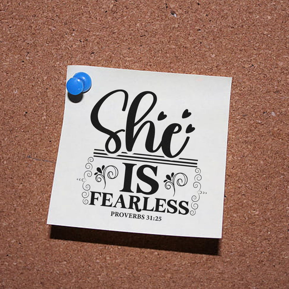 She Is Fearless Premium Wood-Mounted Stamp - Vintage Pro imprint stamped in black ink. Hearts, scrolls, and rules decorate "She is fearless," with Proverbs 31:25.