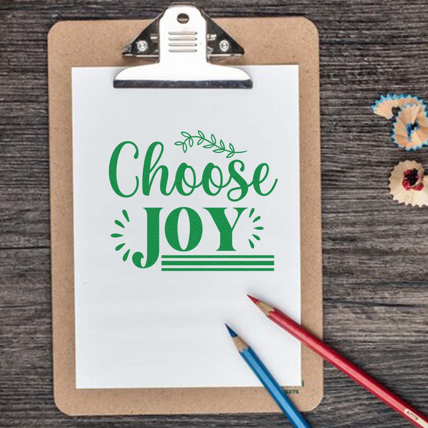 Choose Joy rubber stamp design on a clipboard, perfect for holiday crafts, card making, and handmade gifts.