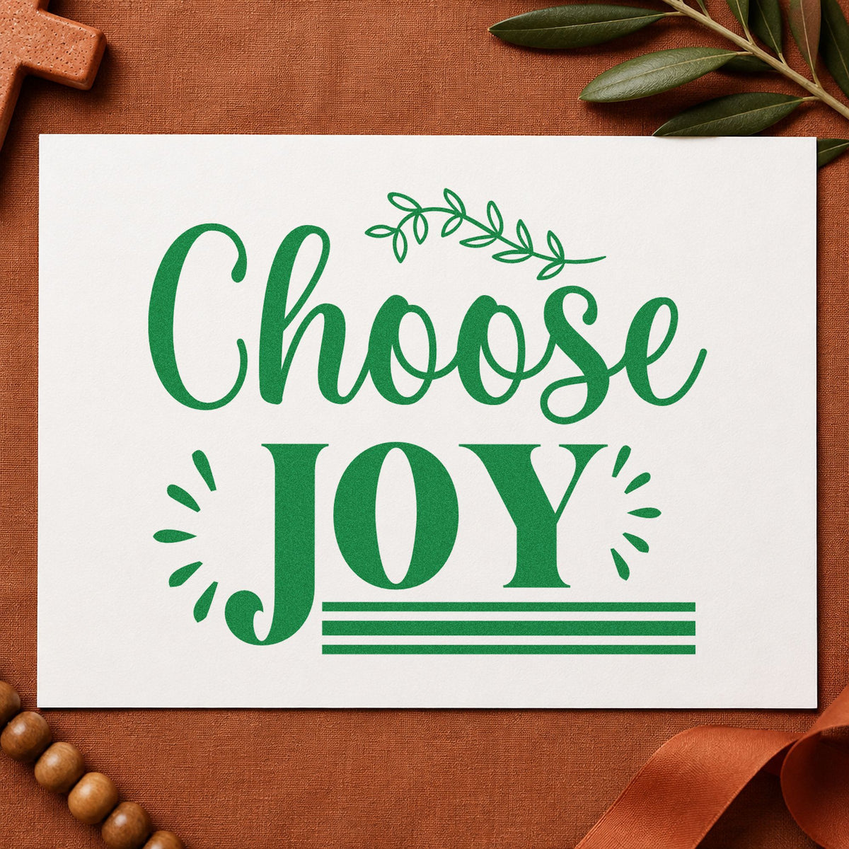 Choose Joy craft stamp imprint in green ink on a handmade project, one idea being summer camp tees.